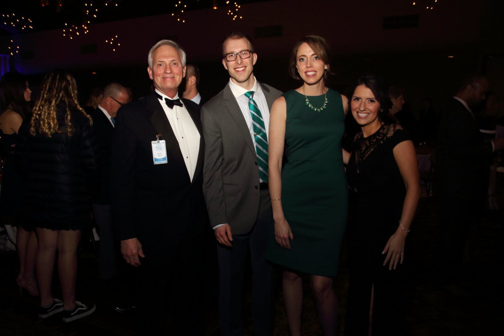 Board Chair Steve Akre, Adam and Sara Kruger, Laura O’Brien